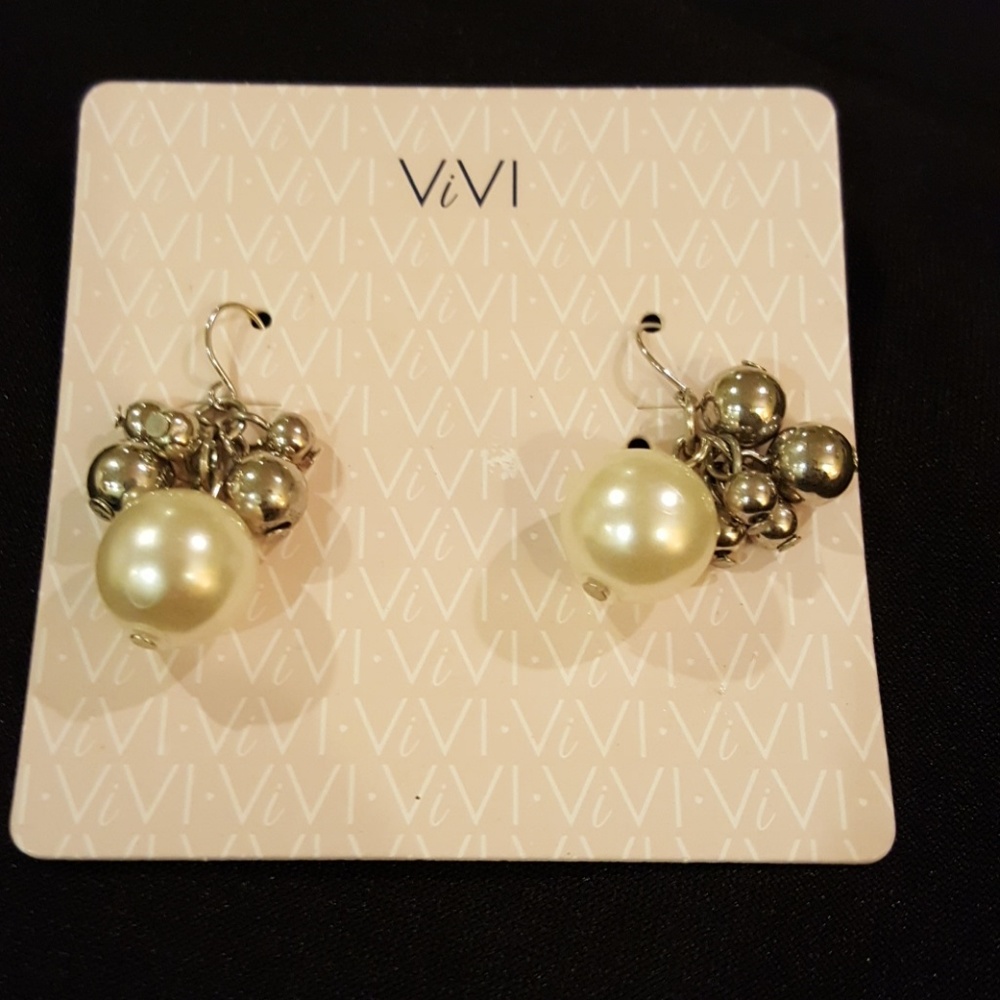 Costume jewelry dangling earrings